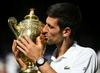Novak Đoković je daljšo krizo prekinil v Wimbledonu, kjer je osvojil svoj 13. grand slam. Foto: Reuters