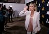 Avgusta je minilo že 40 let od prvega predvajanja Briljantine. Dogodka sta se udeležila oba glavna igralca, Olivia Newton-John in John Travolta. Foto: Reuters