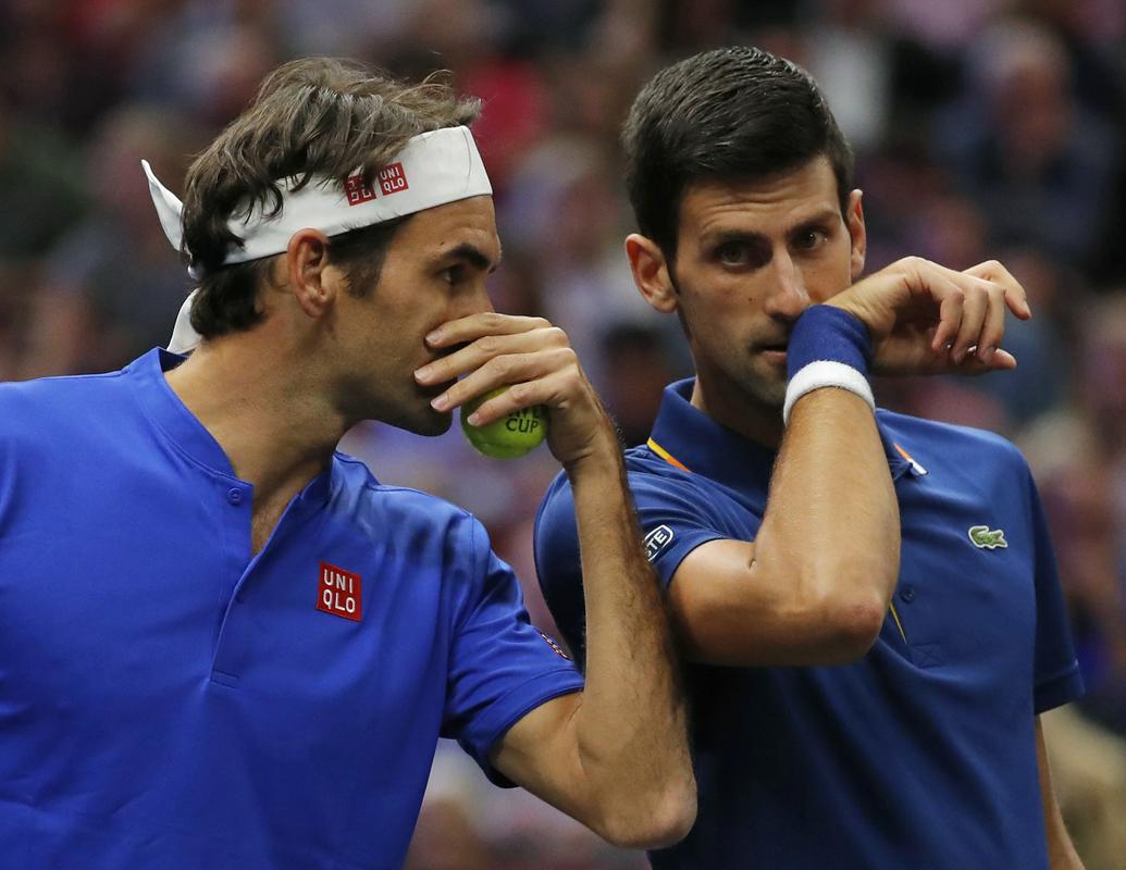 Trije teniški velikani še naprej pišejo teniško zgodovino. Rafael Nadal se je v nedeljo izenačil z Rogerjem Federerjem, ki mu polzi iz rok še en rekord. Tega mu bo, kot vse kaže, odvzel Novak Đoković. Foto: AP Trije teniški velikani še naprej pišejo teniško zgodovino. Rafael Nadal se je v nedeljo izenačil z Rogerjem Federerjem, ki mu polzi iz rok še en rekord. Tega mu bo, kot vse kaže, odvzel Novak Đoković. Foto: AP