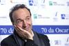 Italijanski igralec, komik, scenarist in režiser Roberto Benigni ostaja nemara najbolj znan po z oskarjem nagrajeni ganljivi komični drami Življenje je lepo. Film mu je prinesel oskarja za najboljšo moško vlogo in najboljši tujejezični film, osvojil pa je tudi kipec za najboljšo izvirno filmsko glasbo. Foto: EPA