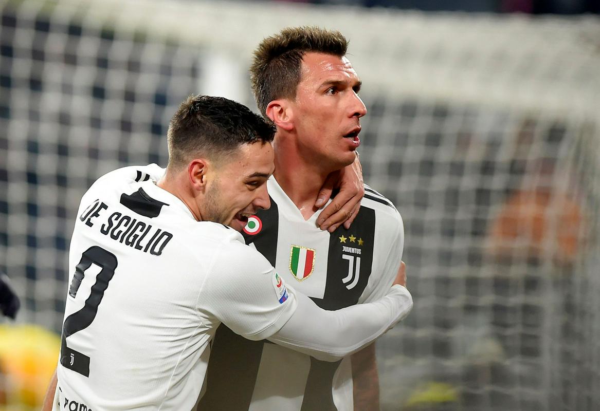 Mattia De Sciglio in Mario Mandžukić proslavljata gol odločitve. Foto: Reuters Mattia De Sciglio in Mario Mandžukić proslavljata gol odločitve. Foto: Reuters