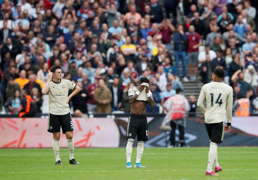 Manchester United je z 2:0 klonil v gosteh pred West Ham Unitedom. Potem ko je Ole Gunnar Solskjaer dobil prvih devet tekem v gosteh kot menedžer rdečih vragov, na zadnjih devetih gostovanjih v vseh tekmovanjih ni okusil slasti zmage (trije neodločeni izidi in kar šest porazov). Foto: Reuters Manchester United je z 2:0 klonil v gosteh pred West Ham Unitedom. Potem ko je Ole Gunnar Solskjaer dobil prvih devet tekem v gosteh kot menedžer rdečih vragov, na zadnjih devetih gostovanjih v vseh tekmovanjih ni okusil slasti zmage (trije neodločeni izidi in kar šest porazov). Foto: Reuters