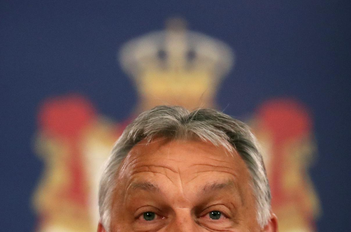 Parlament je premierju Viktorju Orbanu marca s sprejetjem zakonodaje o izrednih razmerah podelil posebna pooblastila, da lahko v državi vlada z odloki za nedoločen čas. Foto: Reuters Parlament je premierju Viktorju Orbanu marca s sprejetjem zakonodaje o izrednih razmerah podelil posebna pooblastila, da lahko v državi vlada z odloki za nedoločen čas. Foto: Reuters