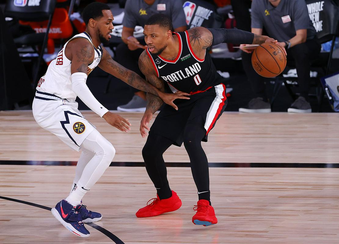 Damian Lillard je z enajstimi trojkami izenačil klubski rekord Portlanda. Blazersi so se zelo približali osmemu mestu na Zahodu. Foto: Reuters Damian Lillard je z enajstimi trojkami izenačil klubski rekord Portlanda. Blazersi so se zelo približali osmemu mestu na Zahodu. Foto: Reuters