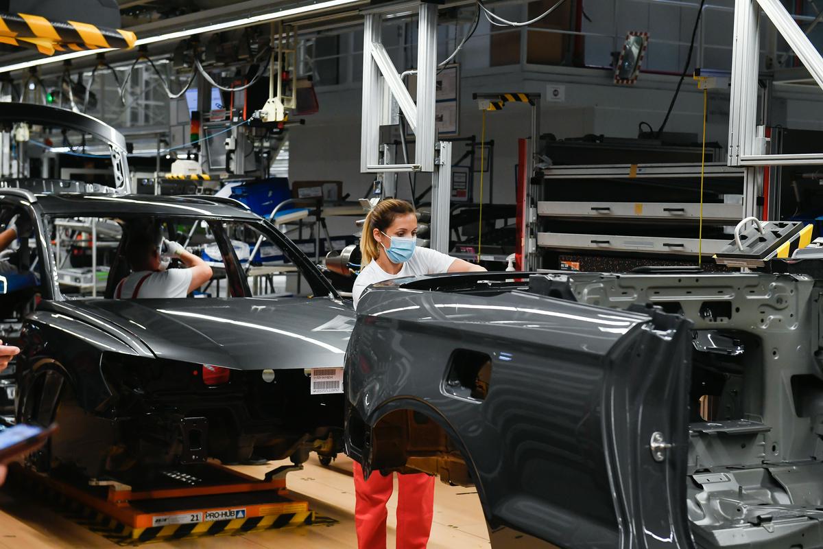 Sindikat IG Mettal predstavlja delavce iz podjetij, kot so Audi, BMW in Porsche.  Je največja unija v Evropi, zato v pogajanjih z vlado pogosto postavlja smernice za druge sindikate.  Foto: EPA