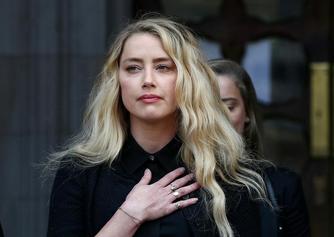 Heardova je bila presrečna nad odločitvijo sodišča. Foto: Reuters Heardova je bila presrečna nad odločitvijo sodišča. Foto: Reuters
